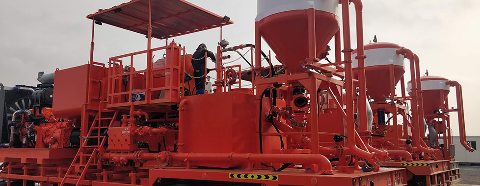 Twin cementing unit with on the fly mixing system