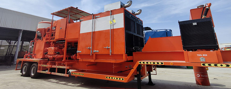 Well services twin cementing unit with enclosure